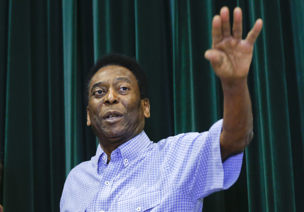 Brazilian soccer great Pele gestures during a news conference at the Albert Einstein Hospital in Sao Paulo, Brazil, Tuesday.