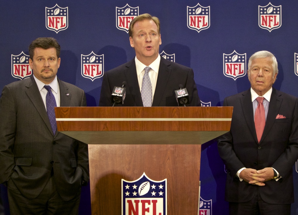 Arizona Cardinals President and Chairman of the NFL’s new Conduct Committee, Michael Bidwill, left, and New England Patriots owner Robert Kraft, right, look on as NFL commissioner Roger Goodell, center,  speaks at an NFL press conference announcing new measures for the league’s personal conduct policy during an owners meeting, Wednesday, in Irving, Texas.