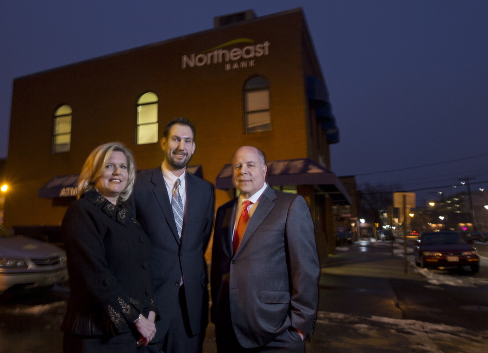 The launching of Northeast Bank’s small-business loan division is being led by, from left, executives Jeanne Hulit, Jonathan Smith and Richard Wayne. The Lewiston-based bank has a branch at 77 Middle St. in Portland, above.