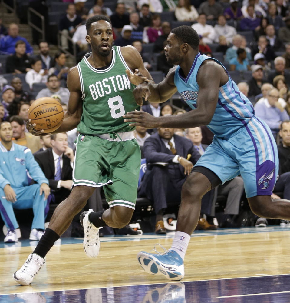 The Celtics’ Jeff Green drives against Charlotte Hornet Lance Stephenson during the first half of Wednesday night’s game in Charlotte, N.C. Green scored 16 points in the game.