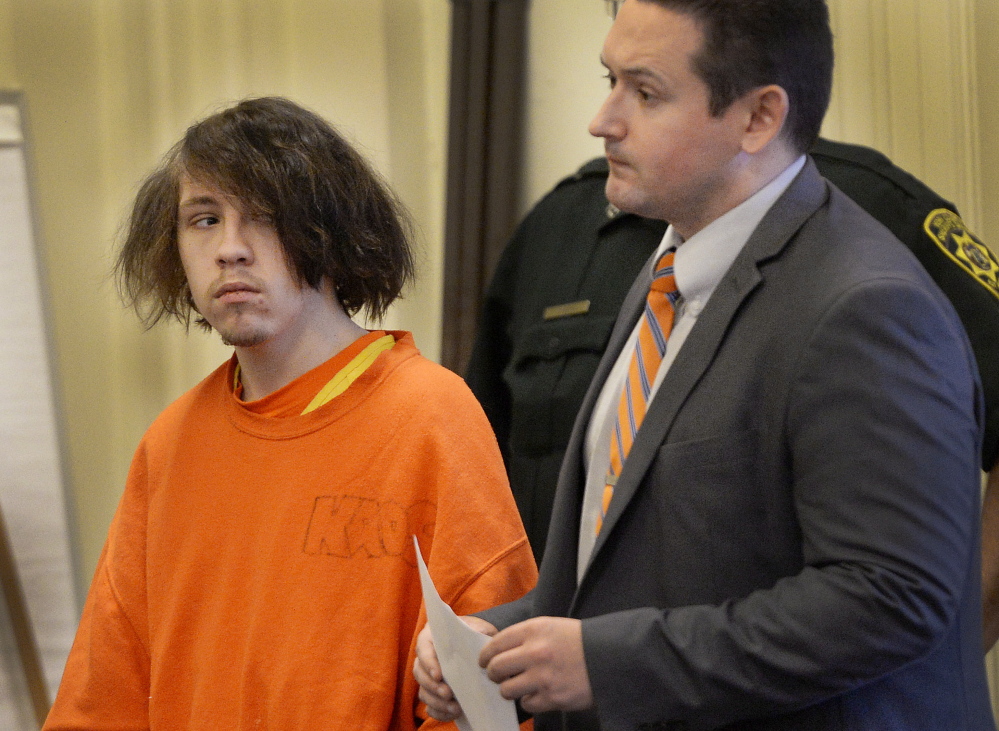 Accused arsonist Dylan Collins, 18, of Biddeford, appears for his arraignment in York County Superior Court in Alfred along with his attorney Will Ashe
