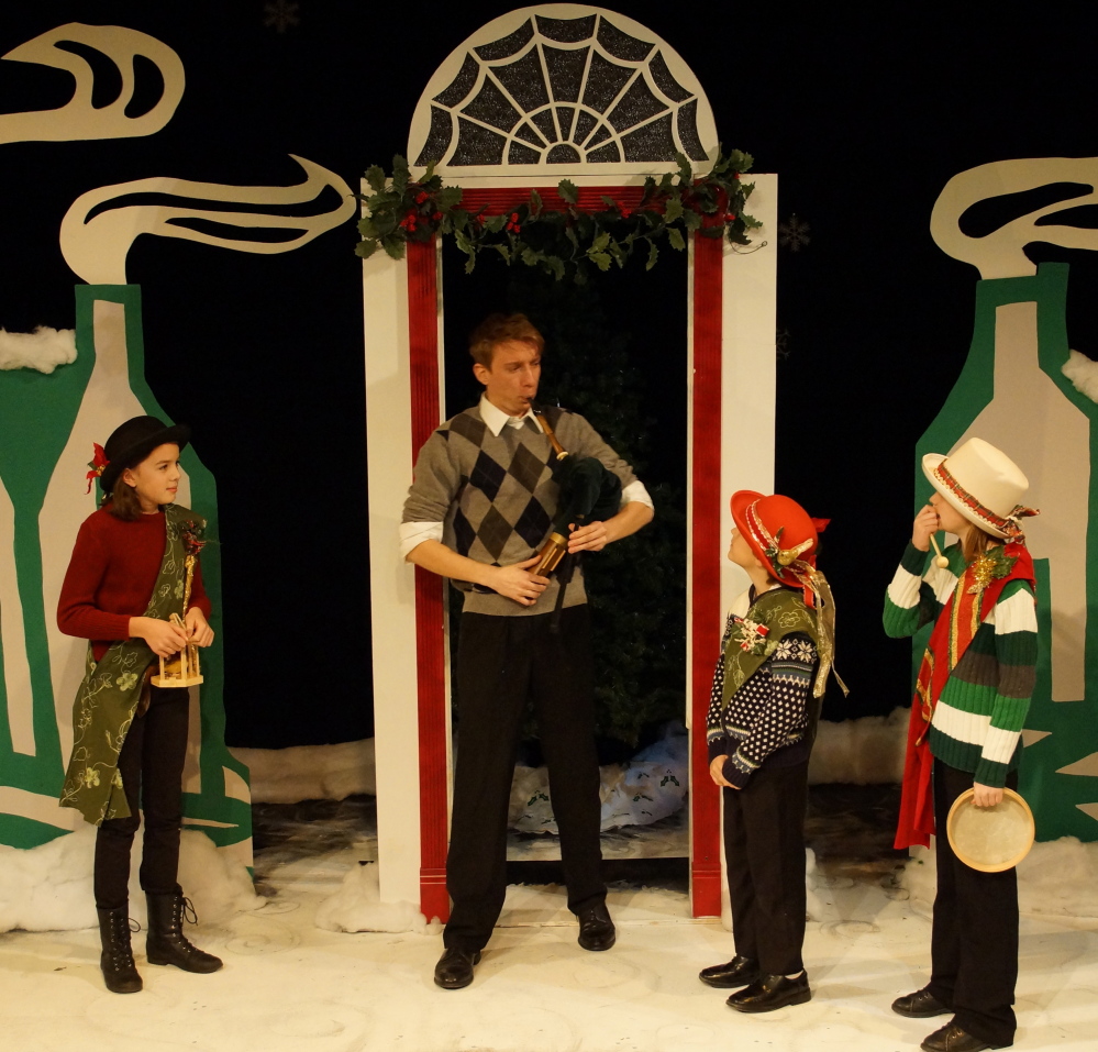 Thomas Ian Campbell and young castmates in the American Irish Repertory Ensemble’s “A Celtic Christmas” at the Studio Theater at Portland Stage Company.