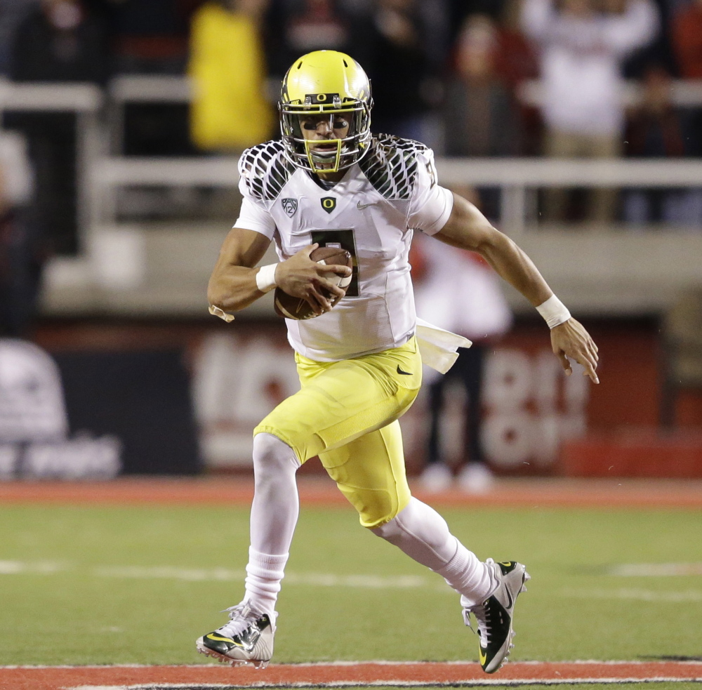 Oregon quarterback Marcus Mariota is the clear favorite to win college football’s Heisman trophy, ahead of fellow finalists running back Melvin Gordon of Wisconsin and wide receiver Amari Cooper of Alabama.