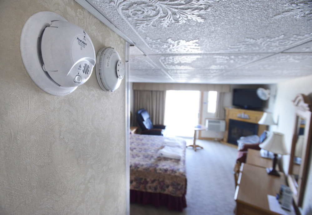 The Lafayette Oceanfront Resort on Wells Beach has combination smoke and carbon monoxide detectors, left, and heat detectors in all its rooms. CO detectors are currently required only in multifamily and rental housing as well as newer single-family homes and hotels, but a Windham legislator plans to submit a bill to mandate the devices in older buildings as well.