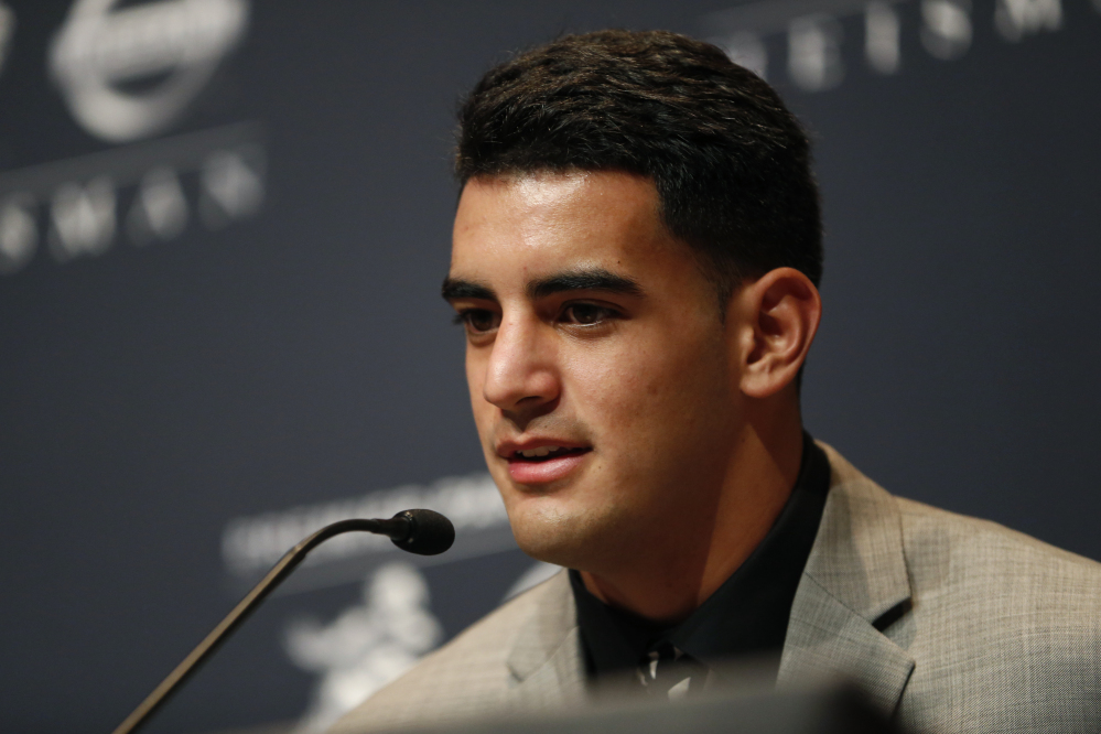 Oregon quarterback Marcus Mariota was named college football’s best player during the Heisman Trophy presentation in New York on Saturday.