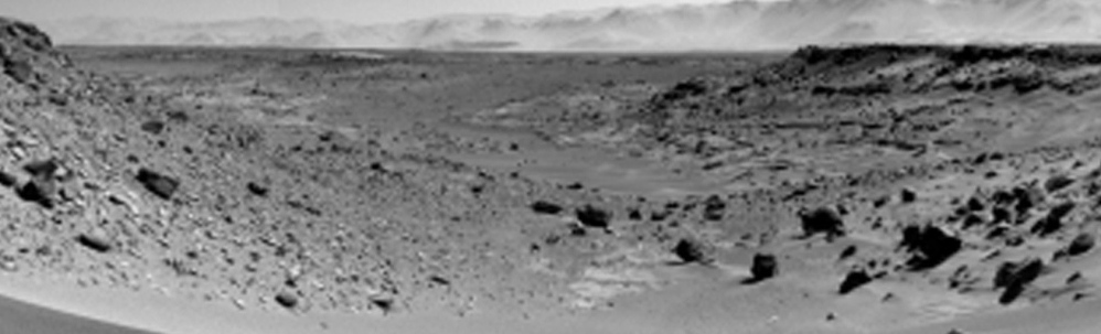 A mosaic of images from the Mars rover camera shows the terrain to the west from the rover’s position on Jan. 30. During the past year, the rover picked up a dramatic tenfold spike in methane gas that lasted several weeks.