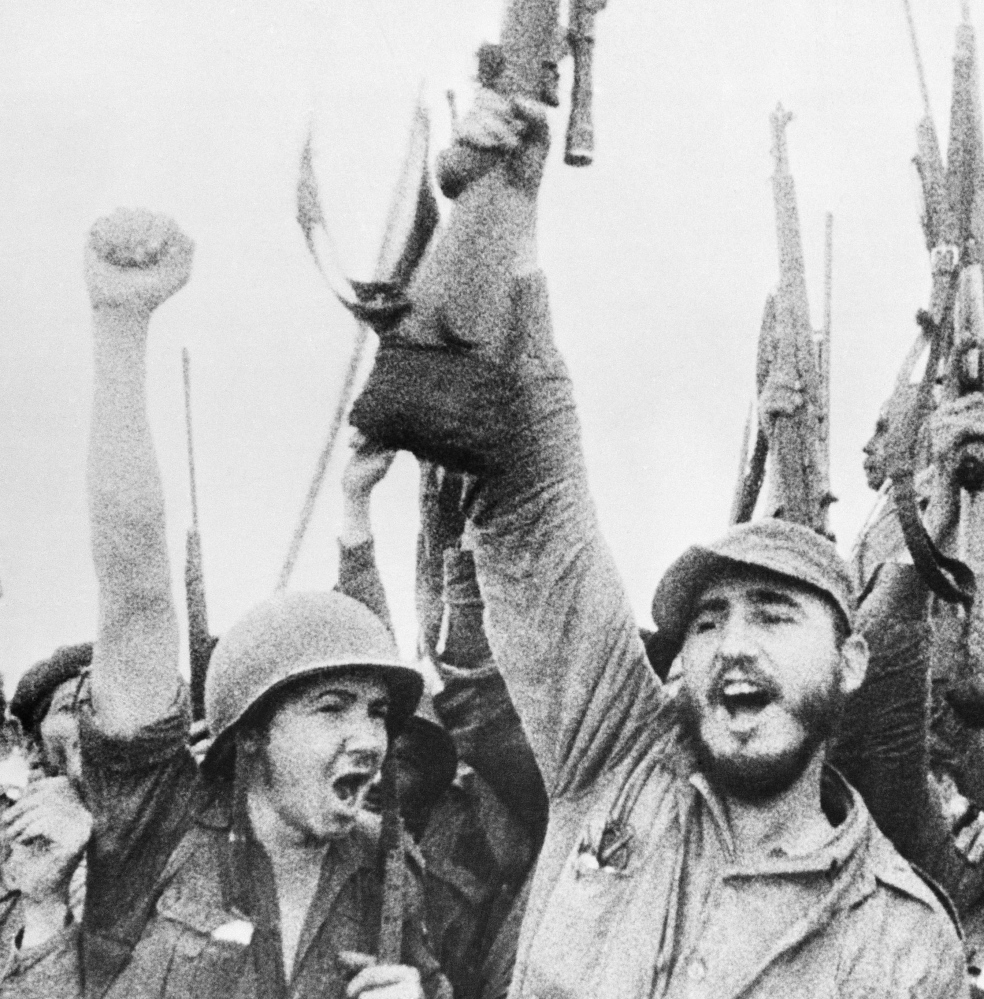 Fidel Castro celebrates with his troops in a photo taken in 1957.