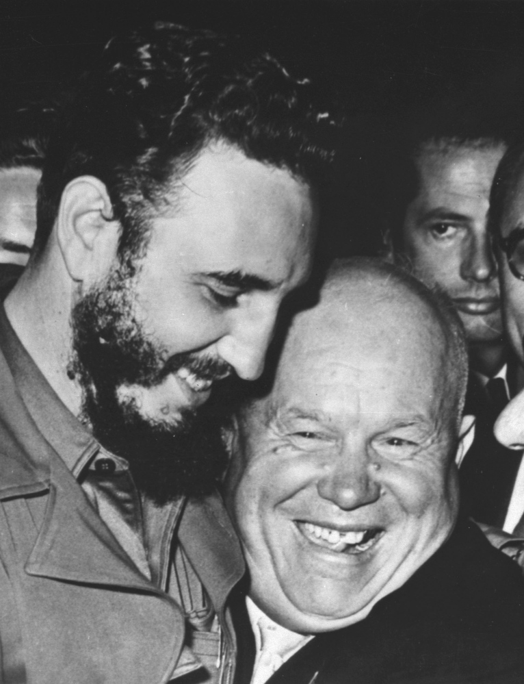 Castro and Soviet Premier Nikita Khrushchev embrace in 1960.