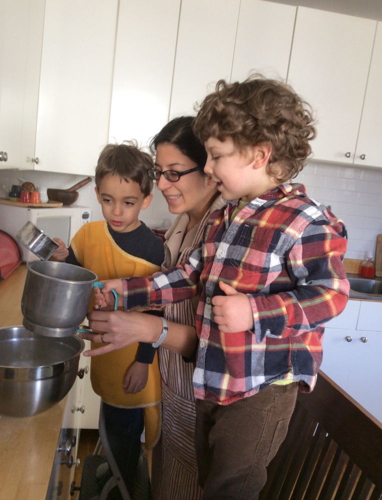 Adán Cuauhtémoc Anderson, 4, his mother, Esmeralda Ulloa, and the author’s son, Theo, 4, making Mexican pan dulce.