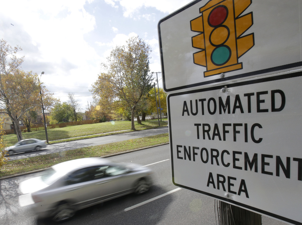 A sign warns of upcoming traffic cameras in Cleveland. A divided Ohio Supreme Court on Thursday again upheld use of traffic camera enforcement by the state’s municipalities.