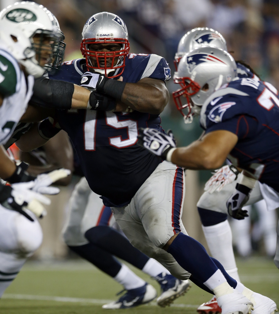 Patriots defensive tackle Vince Wilfork, center, knows that he and his teammates will need to do a better job against the Jets offensive line on Sunday than they did on Oct. 16, when New York ran for 218 yards.