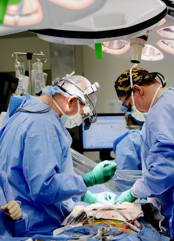 Maine Medical Center doctors and surgery staff in an operating room. Telegram File Photo