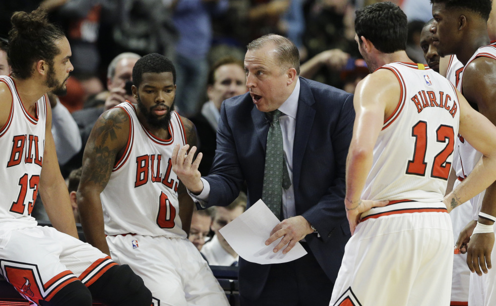 Chicago Coach Tom Thibodeau talks to his team during the second half of the Bulls’ 103-97 victory over the New York Knicks on Thursday night in Chicago. Each team was missing a star in the game – Derrick Rose for the Bulls, and Carmelo Anthony for the Knicks.