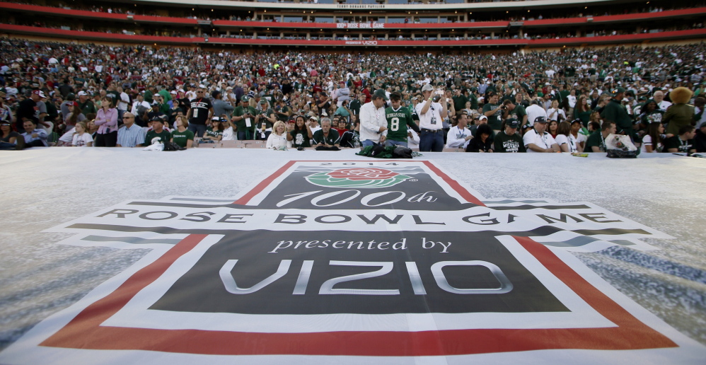 A Rose Bowl banner bears the “presented by Vizio” sponsorship at the Jan. 1 Rose Bowl in Pasadena, Calif. The estimated cost to sponsor a top-tier game like the Rose Bowl ranges from $25 million to more than $30 million.