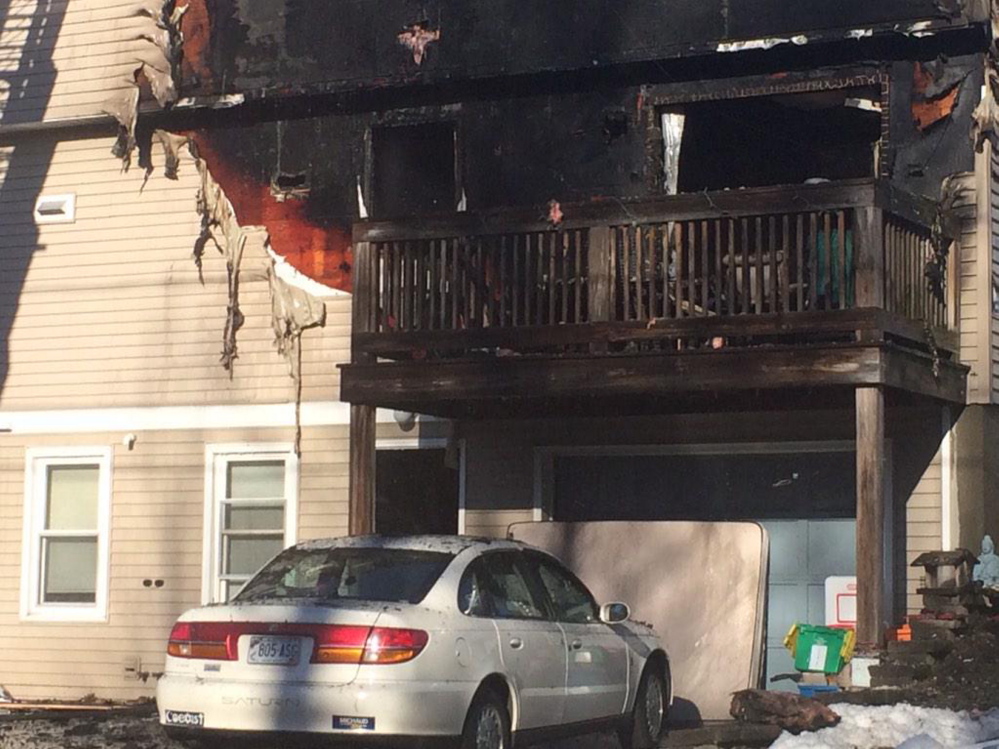 The four-unit building on Unity Lane in Freeport was damaged by fire on Saturday.