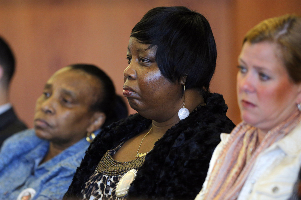 Ursula Ward, center, mother of slain semi-professional football player Odin Lloyd, attends a pretrial hearing for former New England Patriots tight end Aaron Hernandez in Fall River, Mass., Monday.