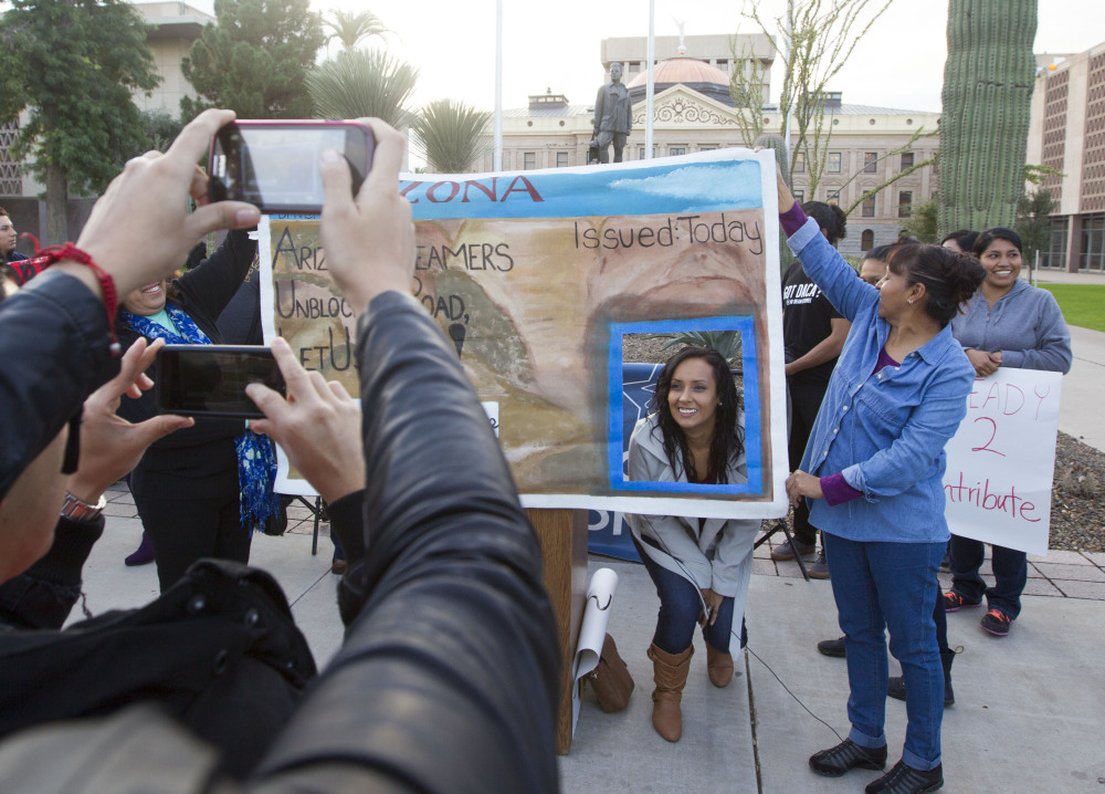 Erika Andiola gets her portrait taken at the Arizona State Capitol on Dec 17 in Phoenix.