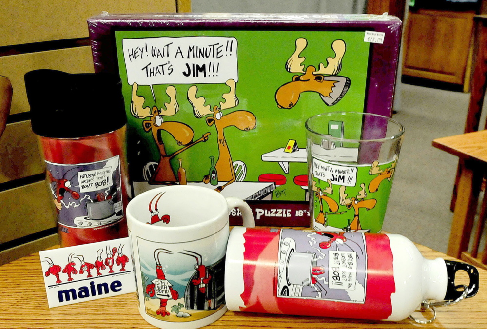 Magnets, coffee and drinking cups and a puzzle created by Maine cartoonist Jeff Pert are among the items popular with tourists.