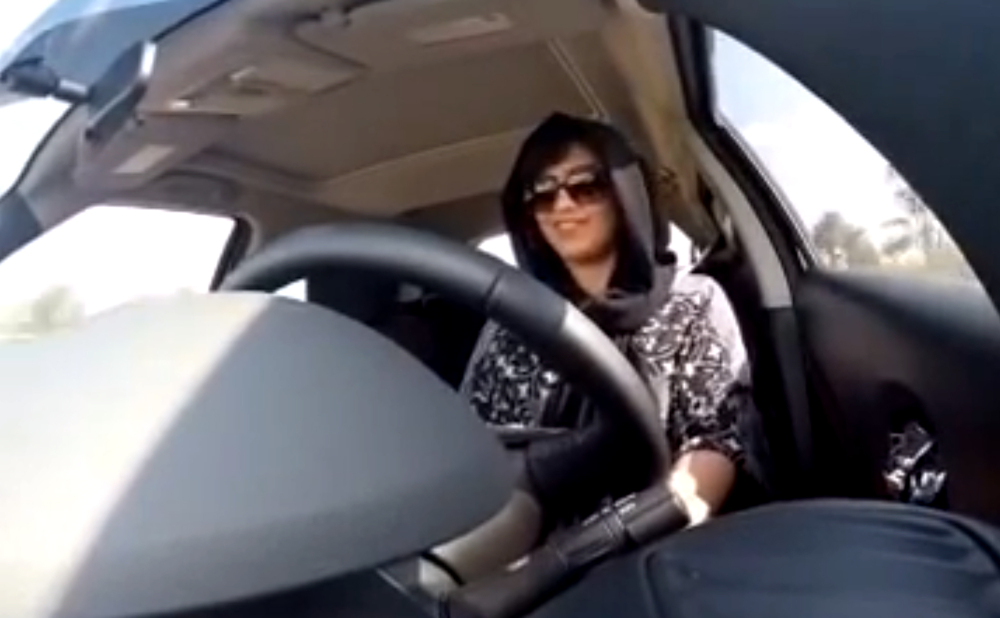 Loujain al-Hathloul, 25, shown driving on Nov. 30, was arrested Dec. 1 in Saudi Arabia. She and Maysa al-Amoudi, 33, were referred Thursday to an anti-terrorism court. established to try terrorism cases on charges related to comments they made on social media. 