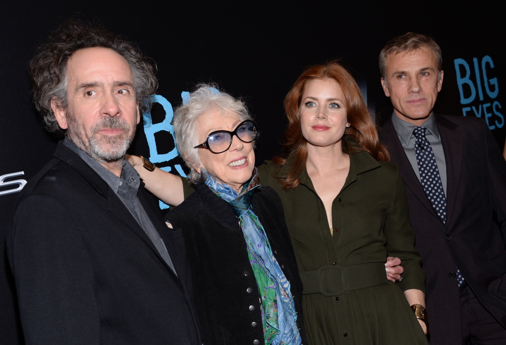 Margaret Keane with director Tim Burton, left, Amy Adams and Christoph Waltz at the premiere of “Big Eyes” at the Museum of Modern Art in New York.
