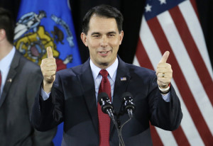 Wisconsin Gov. Scott Walker is setting out to beef up his conservative record on fiscal and social policy. 2014 Associated Press file photo