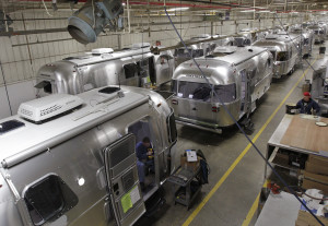 Airstream campers line the factory floor in Jackson Center, Ohio. The iconic travel-trailers have appeared in many movies, including “Raising Arizona” and “Independence Day.” 