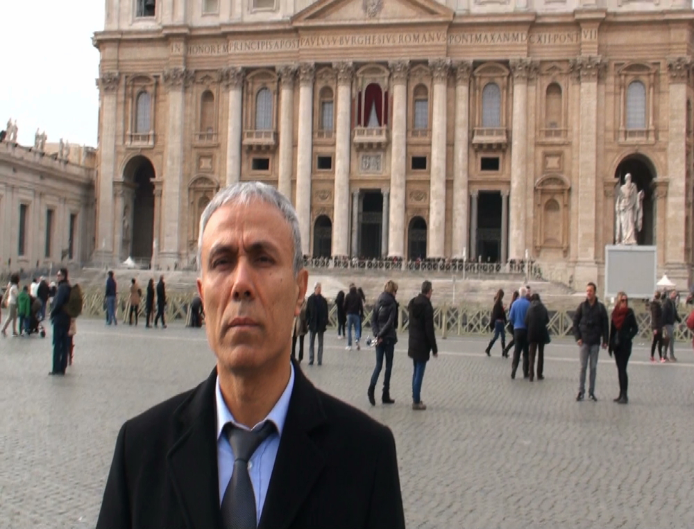 Mehmet Ali Agca stands in front of St. Peter’s Basilica at the Vatican, on Saturday. The Turkish gunman who shot and wounded John Paul II in 1981 and who has been pardoned by the pontiff was heard to mumble, “A thousand thanks, saint.”