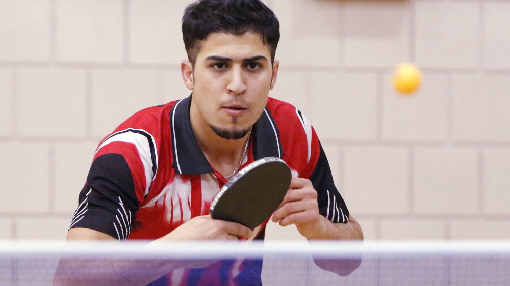 Fouad Abdullah, shown in 2014, quickly became known for his considerable table-tennis skills when he  emigrated to Maine from Iraq.