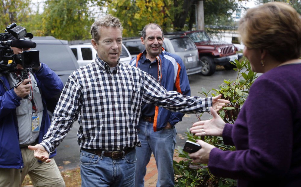 Sen. Rand Paul, R-Ky., seen greeting state Republican Chair Jennifer Horn in Concord, N.H., is showing an ability to appeal to minorities and young  people.