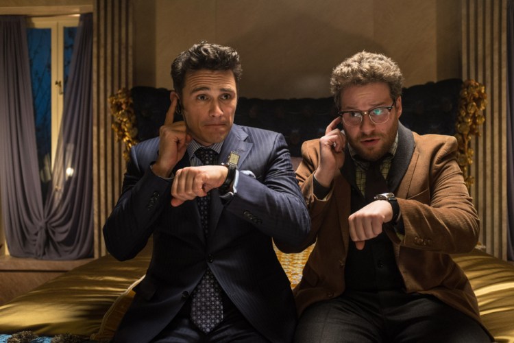 This photo released by Sony - Columbia Pictures shows James Franco, left, as Dave and Seth Rogen as Aaron in a scene from Columbia Pictures’ “The Interview.” (AP Photo/Sony - Columbia Pictures, Ed Araquel)