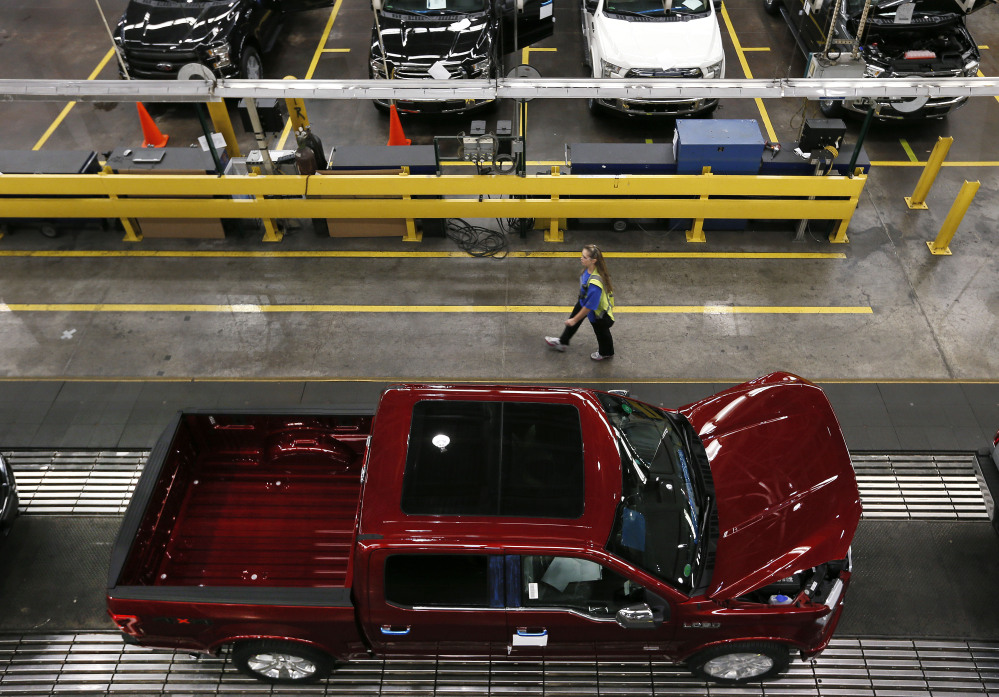 Ford F-150 trucks are produced at the Dearborn Truck Plant in Dearborn, Mich. Six years after its financial system nearly sank and nearly that long since the recession ended, the U.S. seems poised to grow in 2015 at its fastest pace in a decade.