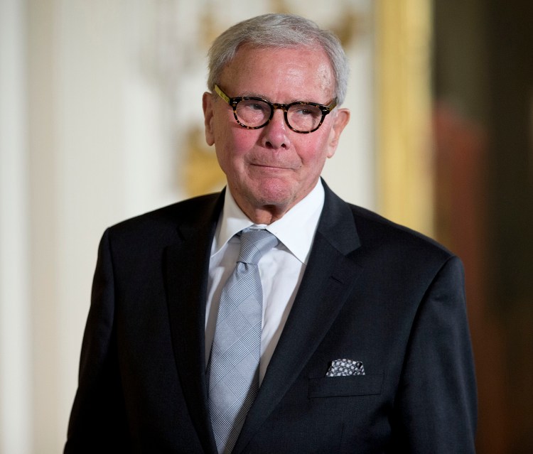 Journalist Tom Brokaw, is introduced before being awarded the Presidential Medal of Freedom, Monday, Nov. 24, 2014, during a ceremony in the East Room of the White House in Washington.  The Associated Press