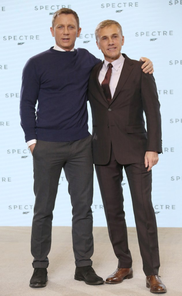Daniel Craig, left, and Christoph Waltz appear at the announcement for the new Bond film "SPECTRE," the 24th in the series, at Pinewood Studios in London, Thursday. The Associated Press