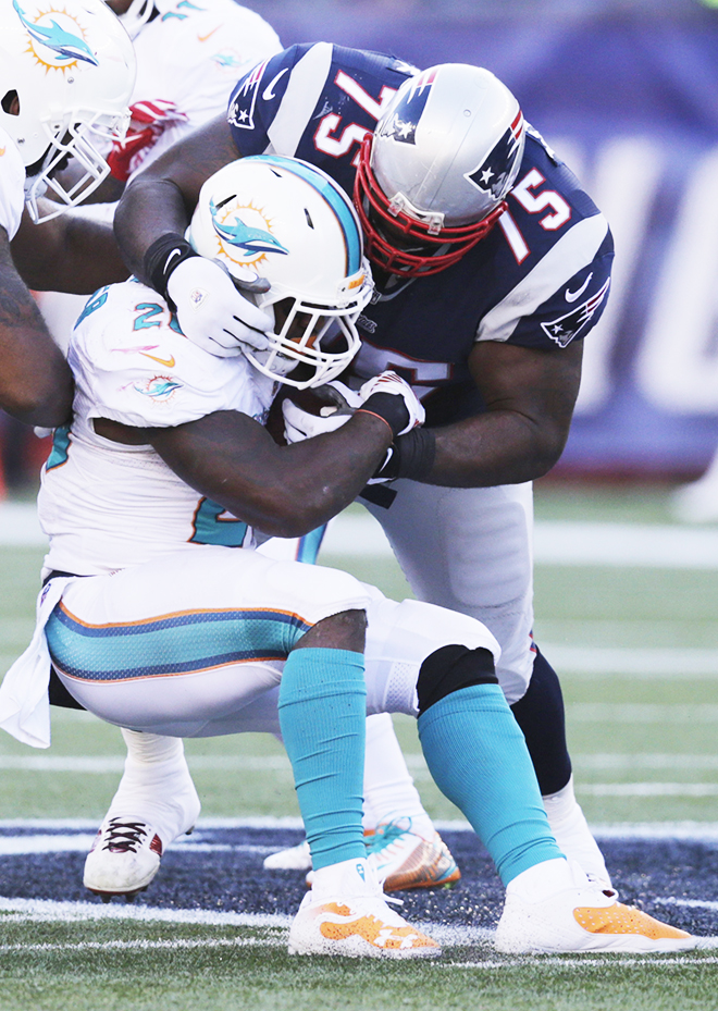 A monster in the midway, New England defensive tackle Vince Wilfork showed Miami running back Lamar Miller the futility of running inside during Sunday’s lopsided thrashing of the Dolphins. The Associated Press