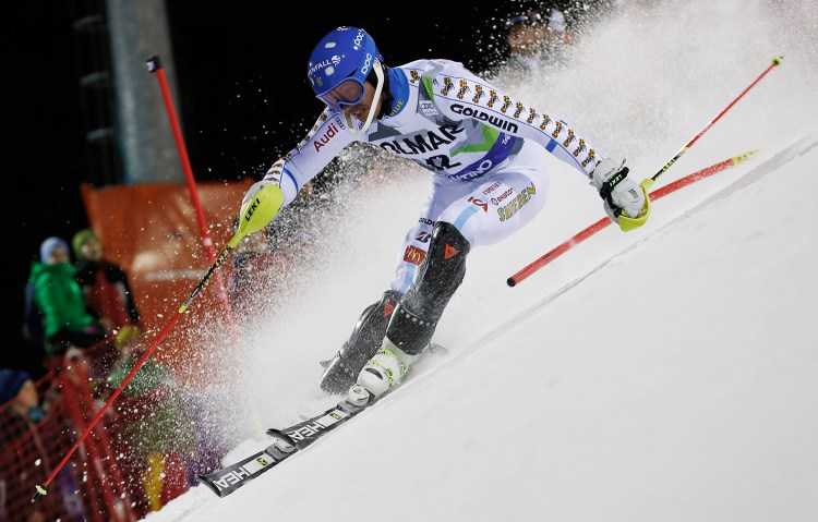 Andre Myhrer of Sweden competes during the first run of the men's World Cup slalom in Madonna di Campiglio, Italy, on Monday. Few of the skiers embrace a new airbag system that will be available for them.