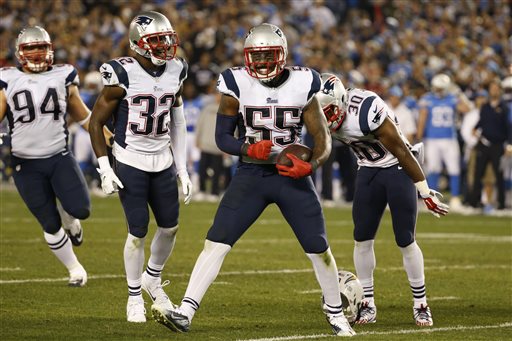 Patriots outside linebacker Akeem Ayers (55) celebrates his interception against the San Diego Chargers on Sunday. The Associated Press