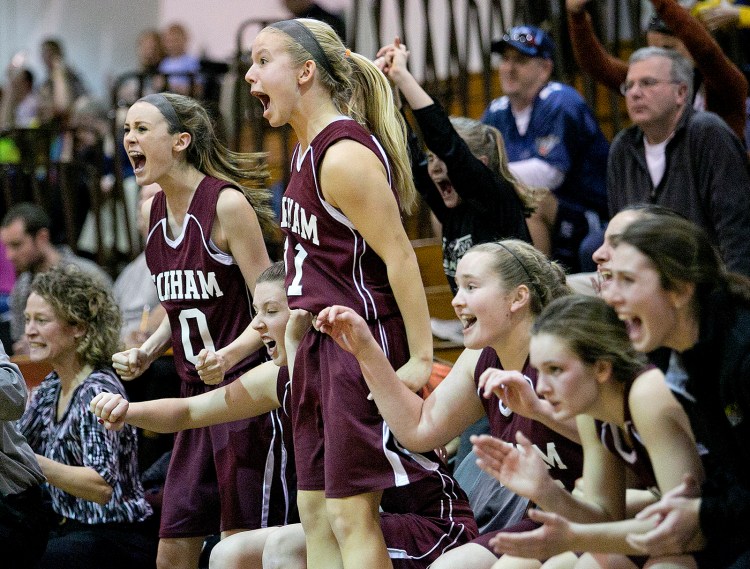 The Gorham bench erupts as they make a late comeback during a girls basketball game at Thornton Academy, Monday in Saco. Gabe Souza / Staff Photographer