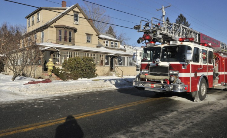 The Winthrop fire department responds to a fire Saturday morning at a four-unit apartment house at 100 Route 133 in Winthrop. Joe Phelan/Kennebec Journal