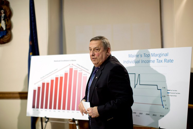 Gov. Paul LePage describes his plan to cut income taxes and eliminate the estate tax while increasing and expanding the sales tax, during a news conference Jan. 9.