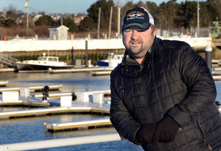 Capt. Mike Faulkingham is a charter boat captain, seen at his home port at Spring Point Marina in South Portland. He said, "There isn’t a guide here who’s not thrilled" about a mandate to reduce the number of striped bass that can be caught by recreational fishermen.