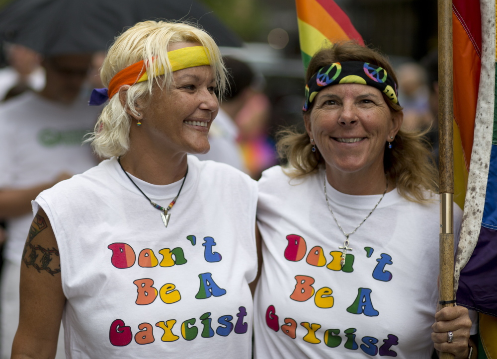 Kimmy Denny and Barb Lawrence of Palm Harbor, Fla., wait outside a gay marriage hearing in Miami last year.  Same-sex couples may soon be able to wed in Florida.