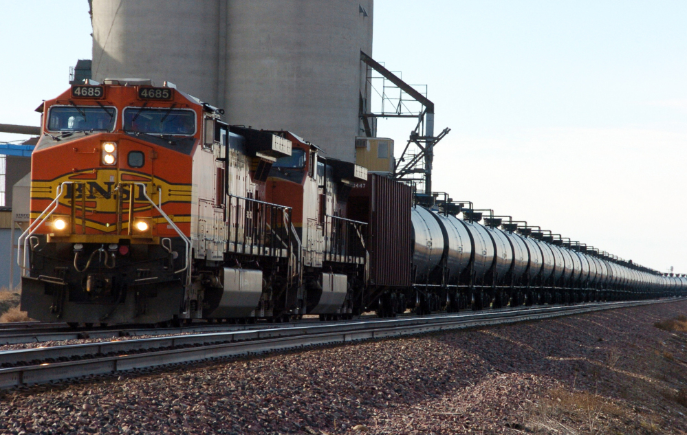 A BNSF Railway train hauls crude oil near Wolf Point, Mont. Crude oil shipments remain less than 2 percent of all the carloads major U.S. railroads deliver.