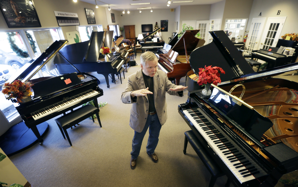 Retailer Jim Foster talks about closing his Foster Family Music Center in Bettendorf, Iowa, last month. When he opened his store 30 years ago, he had 10 competitors who sold just pianos. None of the stores remain.
