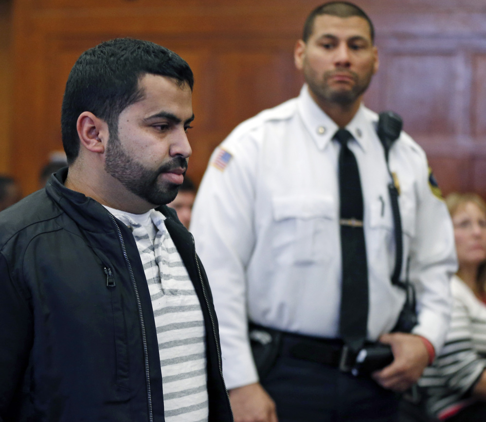 Mohamed Alfageeh, 30, of Boston’s Allston neighborhood, stands in Suffolk Superior Court in Boston on Friday. He pleaded guilty to two counts of motor vehicle homicide in the deaths of John Lanzillotti, 28, and Jessica Campbell, 27.