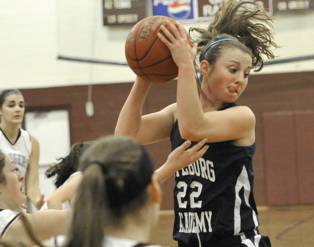 Julia Quinn of Fryeburg Academy emphatically hauls down a rebound Friday night during the Western Maine Conference game in Cumberland. Greely came away with a 39-31 victory, its sixth consecutive win to improve to 6-1. Fryeburg is 3-4.