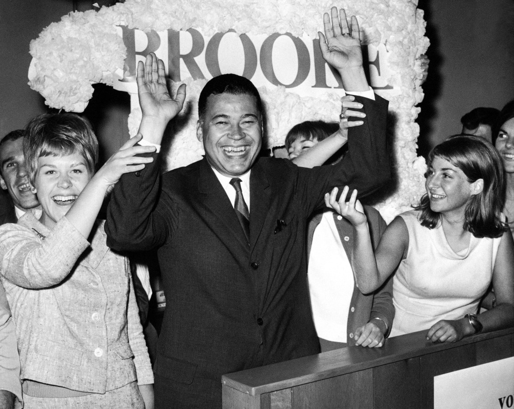Edward W. Brooke celebrates with campaign workers on Sept. 14, 1966, in Boston after winning the Republican nomination for U.S. Senate.