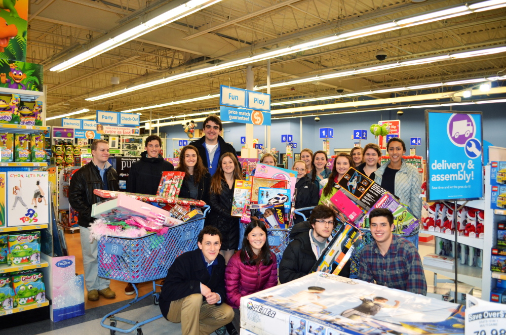 Berwick  Academy students set a record by raising $2,400 to fulfill Toys for Tots requests in 2014. This marks the 20th year that students have participated in the program of helping to fulfill the Christmas wishes of needy residents by adopting star gift requests from the town's Christmas tree. Photo courtesy Tracey Boucher