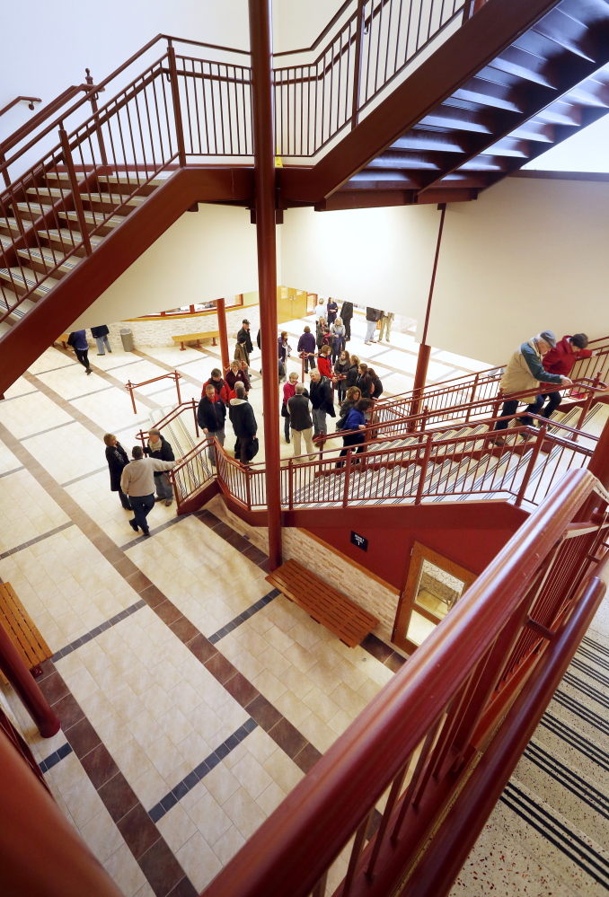 People visit during an open house Sunday at South Portland High School to view the completed $47.3 million renovation and expansion.