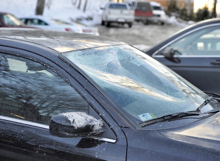 A chunk of ice caved in the windshield of Heather Rossignol’s car Sunday while she was driving on the Maine Turnpike in Scarborough. She was able to safely pull off the highway.
