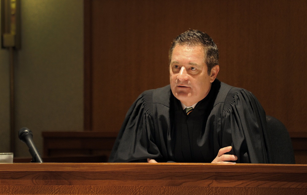 Judge Jeffrey Moskowitz addresses a client during a drug court session in Cumberland County Superior Court in 2013. The judge made a controversial ruling this week when he ordered the media not to report on witness testimony in a high-profile case.